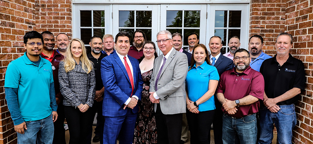 Steve Meek with The Fulcrum Group team in Keller, Texas